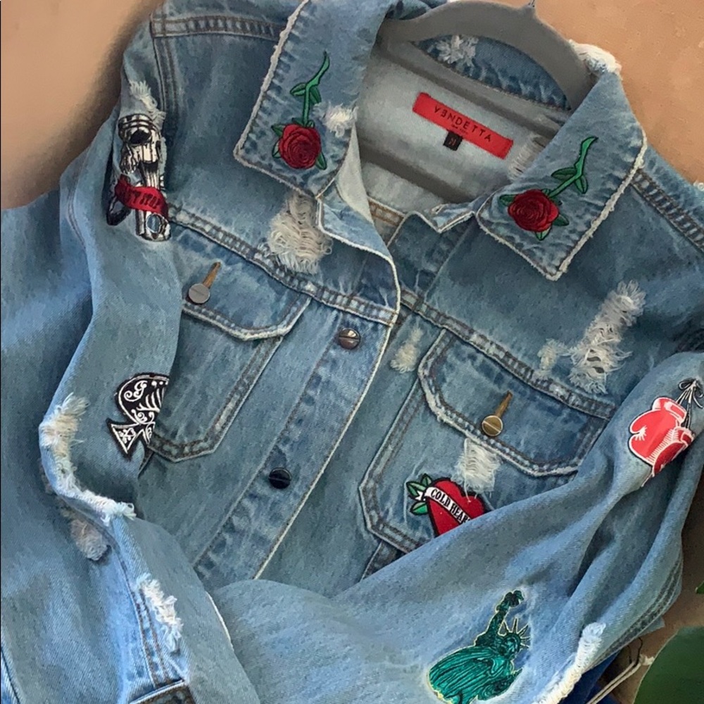 Oversized patched distressed denim jacket